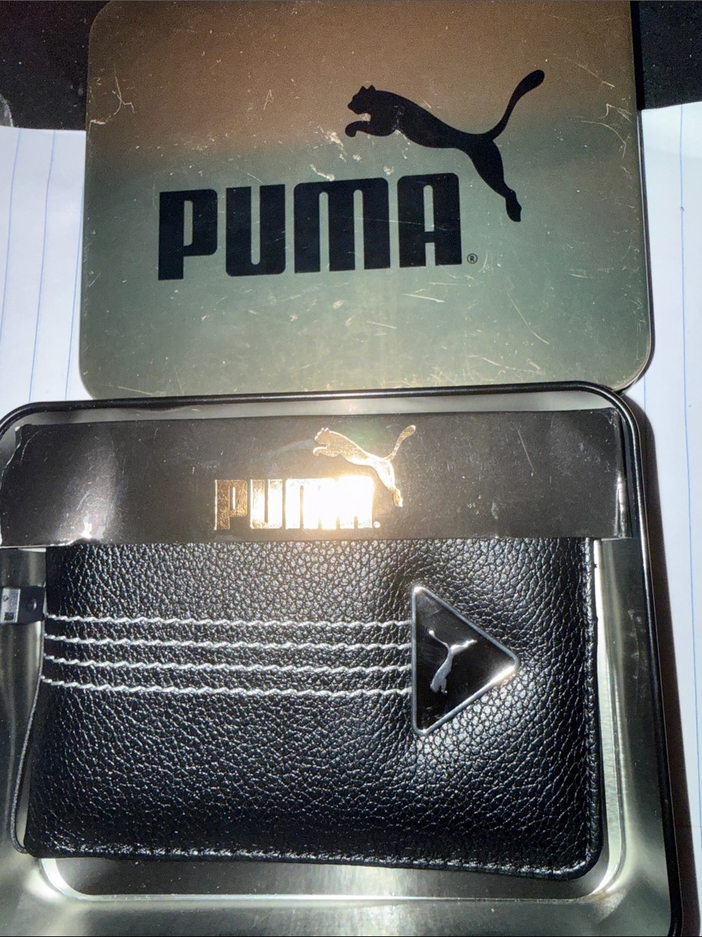 Puma Black Bi-Fold Wallet with White Stitching and Metal